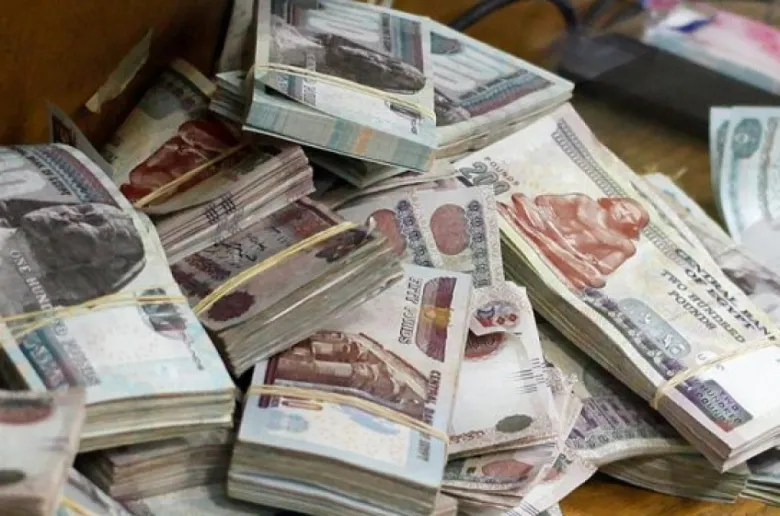 بنكا الأهلي ومصر يواصلان صرف 1.3 تريليون جنيه حصيلة شهادات الـ 27% و23.5%